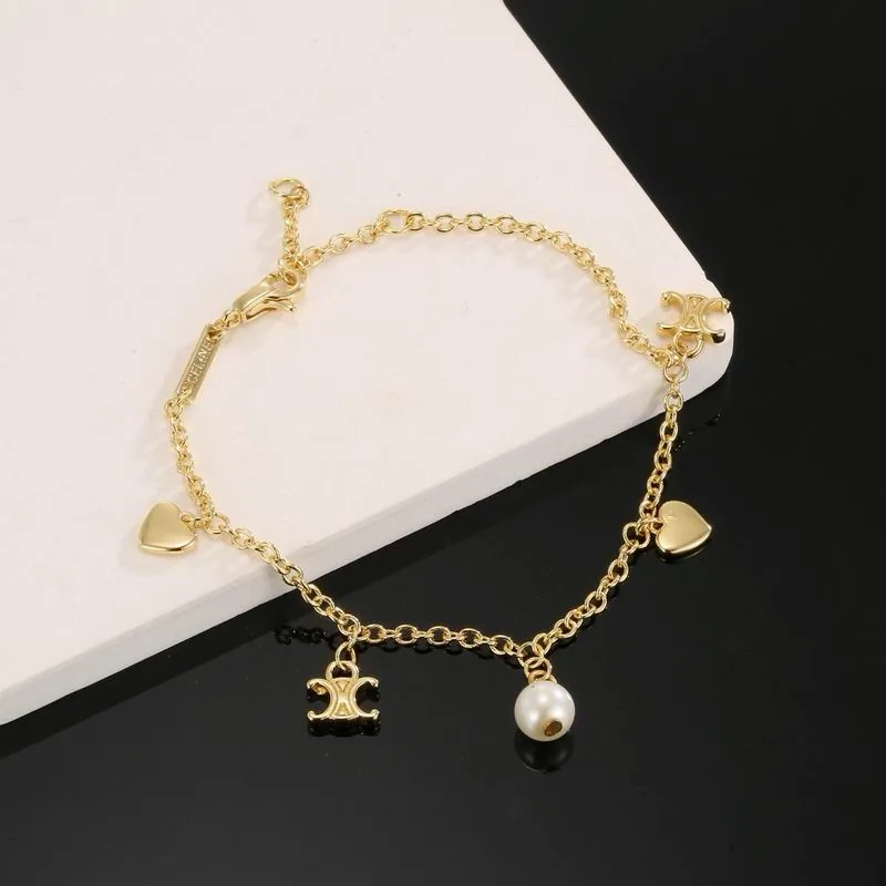Celine gold-tone bracelet with multiple charms, catalog view 5, 07yxs06