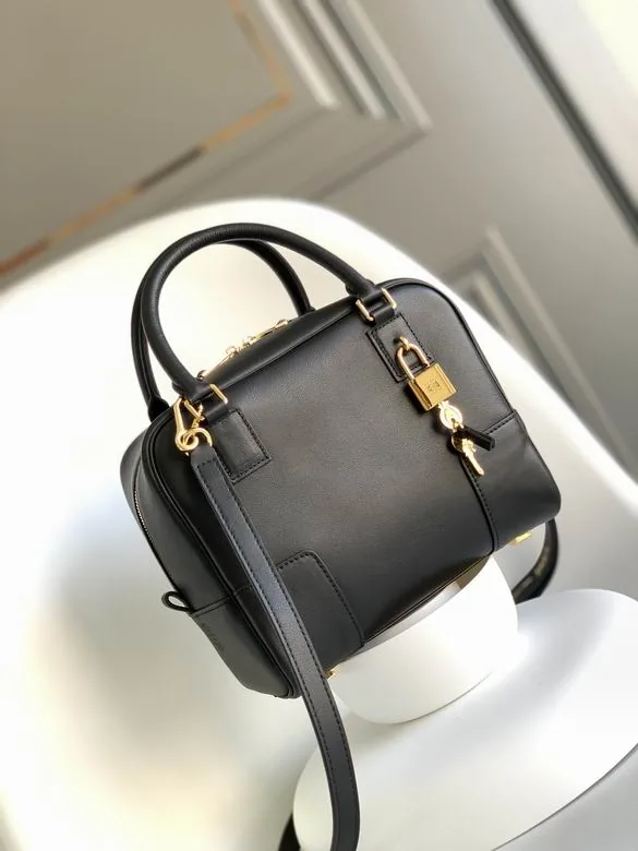 Loewe Amazona 062123 Black Top-Handle Bag black structured top handle bag with gold-tone hardware and compact body view 1