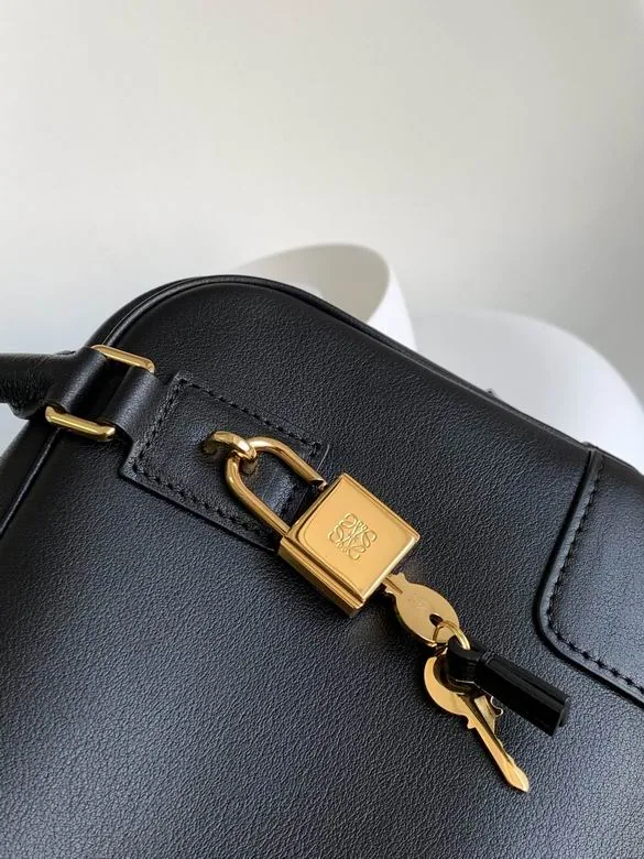 Loewe Amazona 062123 Black Top-Handle Bag black structured top handle bag with gold-tone hardware and compact body view 4