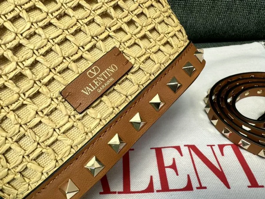 Valentino 2044 Natural Woven Bucket Bag compact natural woven bucket bag with top handle, trim, and strap shown view 4