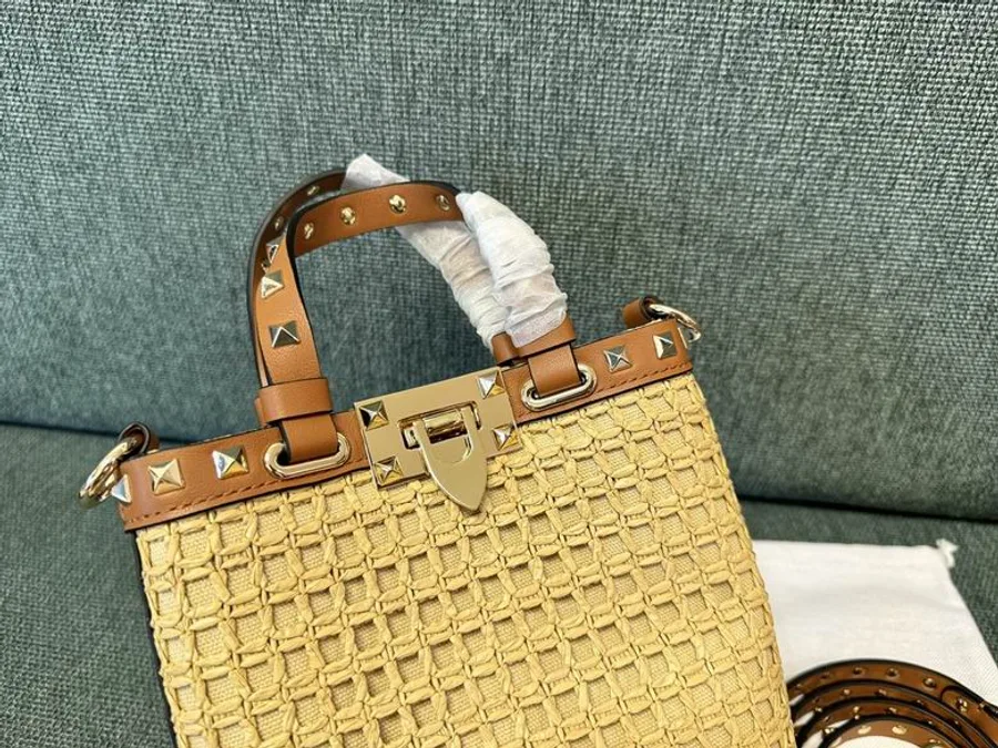 Valentino 2044 Natural Woven Bucket Bag compact natural woven bucket bag with top handle, trim, and strap shown view 5