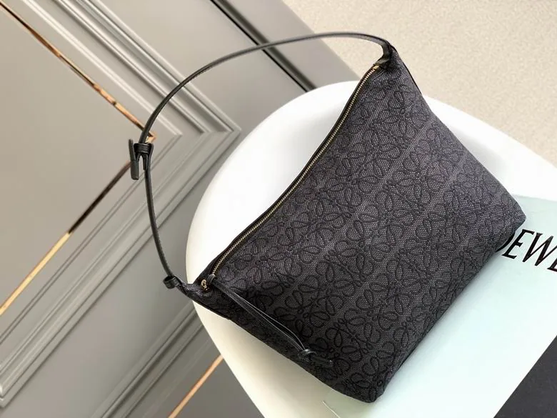 Loewe Anagram Tote 062102 Black Pattern Tote Bag black patterned tote bag with top handles and embossed anagram patch view 1