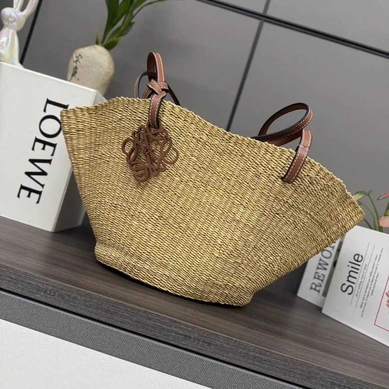 Loewe Basket 052514 Natural Woven Tote Bag natural woven basket tote with tan handles and open top view 1