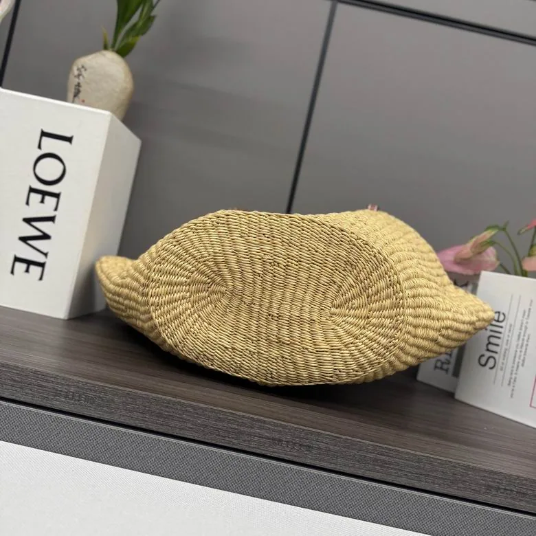 Loewe Basket 052514 Natural Woven Tote Bag natural woven basket tote with tan handles and open top view 4