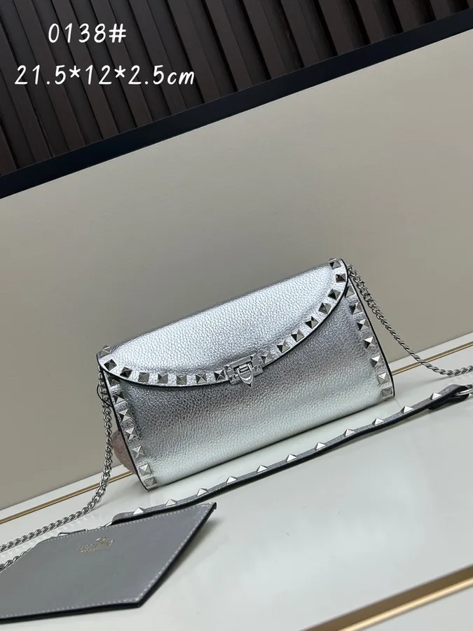 Valentino Rockstud 0138 Silver Chain Shoulder Bag silver compact chain shoulder bag with stud-like trim and flap profile view 1