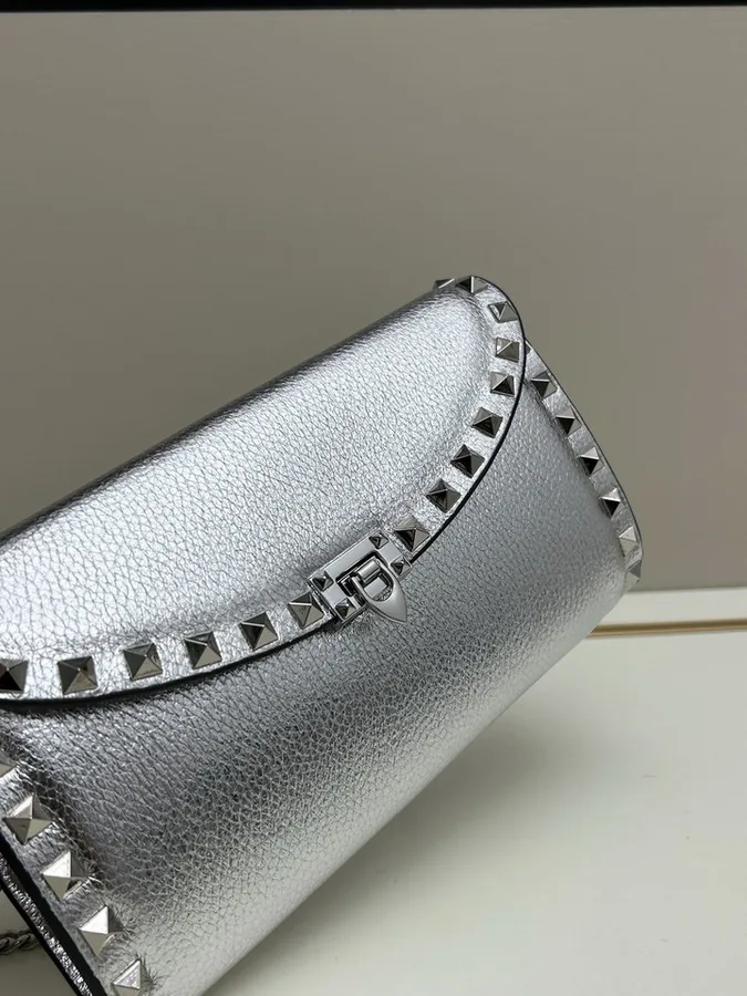 Valentino Rockstud 0138 Silver Chain Shoulder Bag silver compact chain shoulder bag with stud-like trim and flap profile view 3