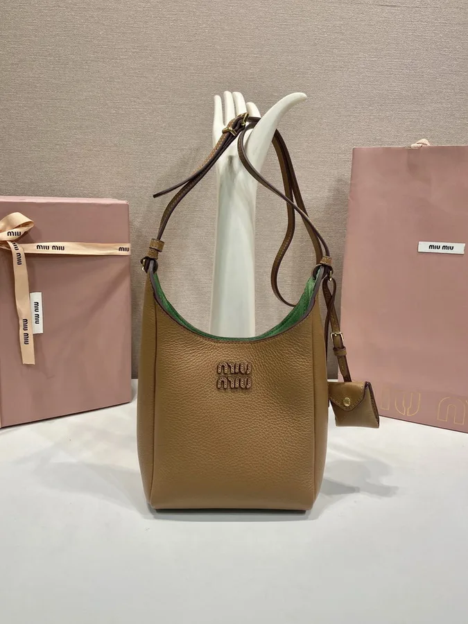 Miu Miu 5BB099 Tan Vertical Shoulder Bag tan vertical shoulder bag with green interior accent view 1