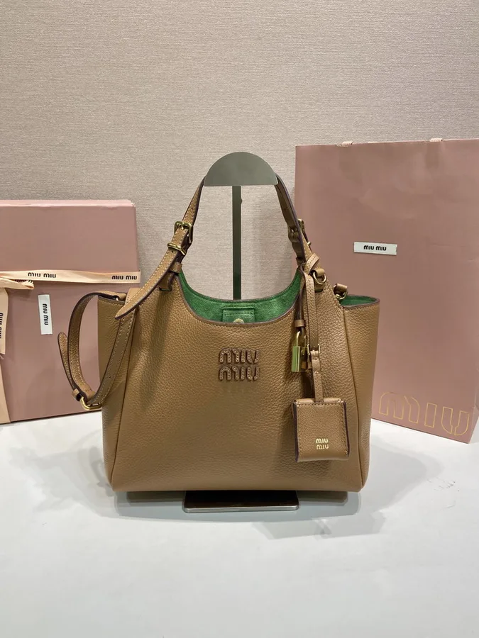 Miu Miu 5BB304 Tan Structured Tote Bag tan structured tote bag with twin handles and green interior accent view 1