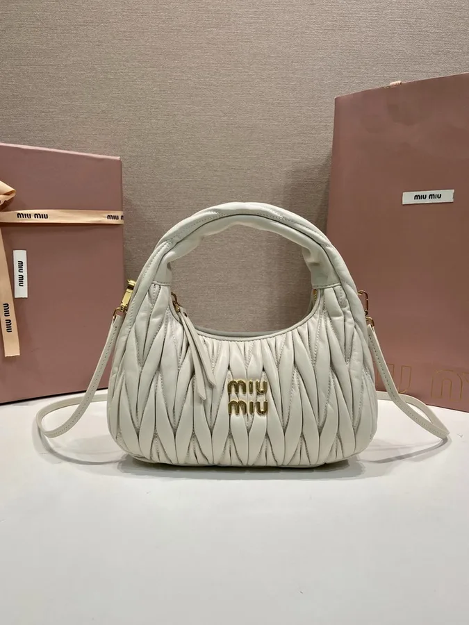 Miu Miu Wander 5BB125 Ivory Quilted Shoulder Bag ivory quilted rounded shoulder bag with side ties view 1