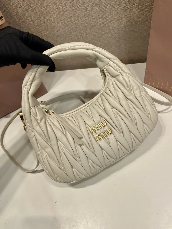 Miu Miu Wander 5BB125 Ivory Quilted Shoulder Bag ivory quilted rounded shoulder bag with side ties view 3