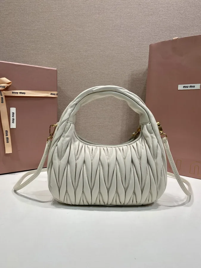 Miu Miu Wander 5BB125 Ivory Quilted Shoulder Bag ivory quilted rounded shoulder bag with side ties view 4