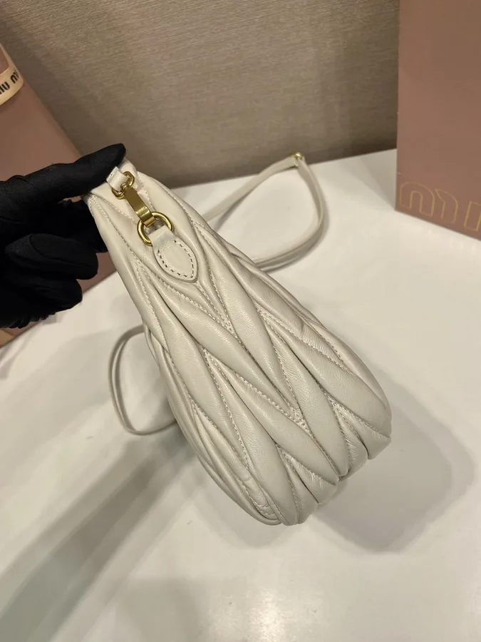 Miu Miu Wander 5BB125 Ivory Quilted Shoulder Bag ivory quilted rounded shoulder bag with side ties view 5