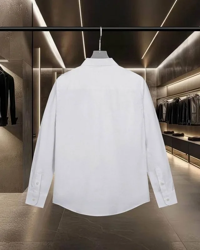 Givenchy small wordmark shirts in white and black front view hgntx22
