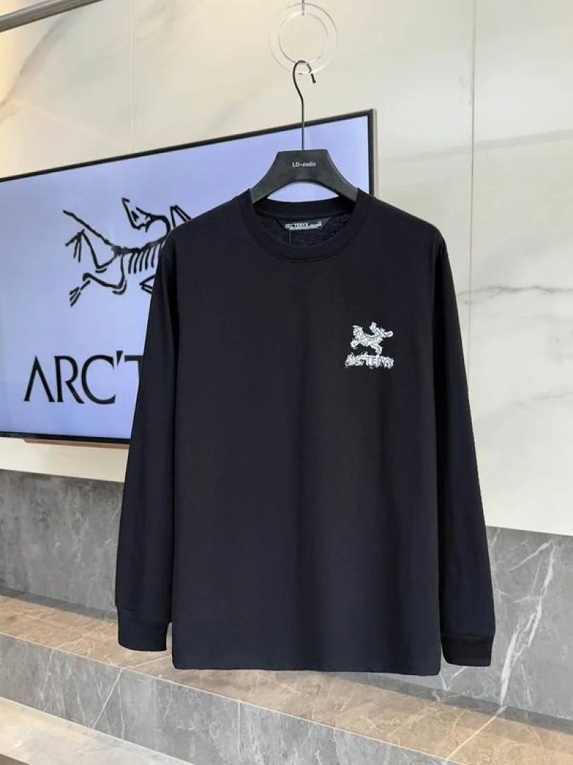 Black Arcteryx cross-graphic long-sleeve top front view hgntx26045