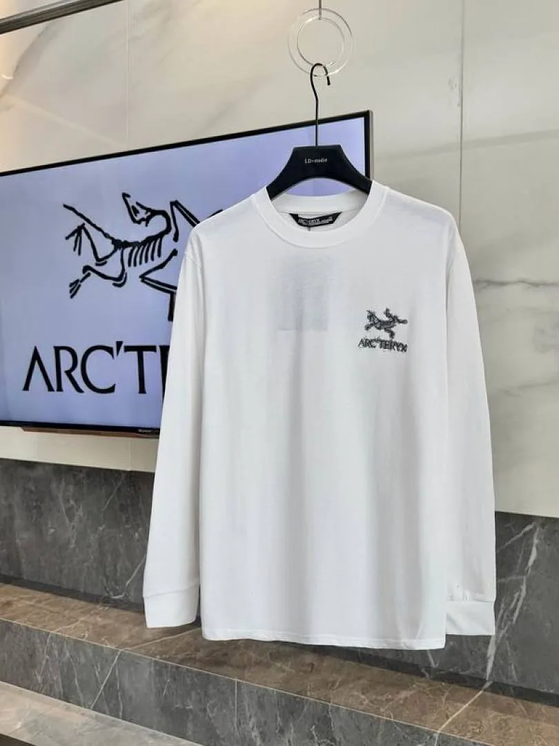 White Arcteryx cross-graphic long-sleeve top front view hgntx26045