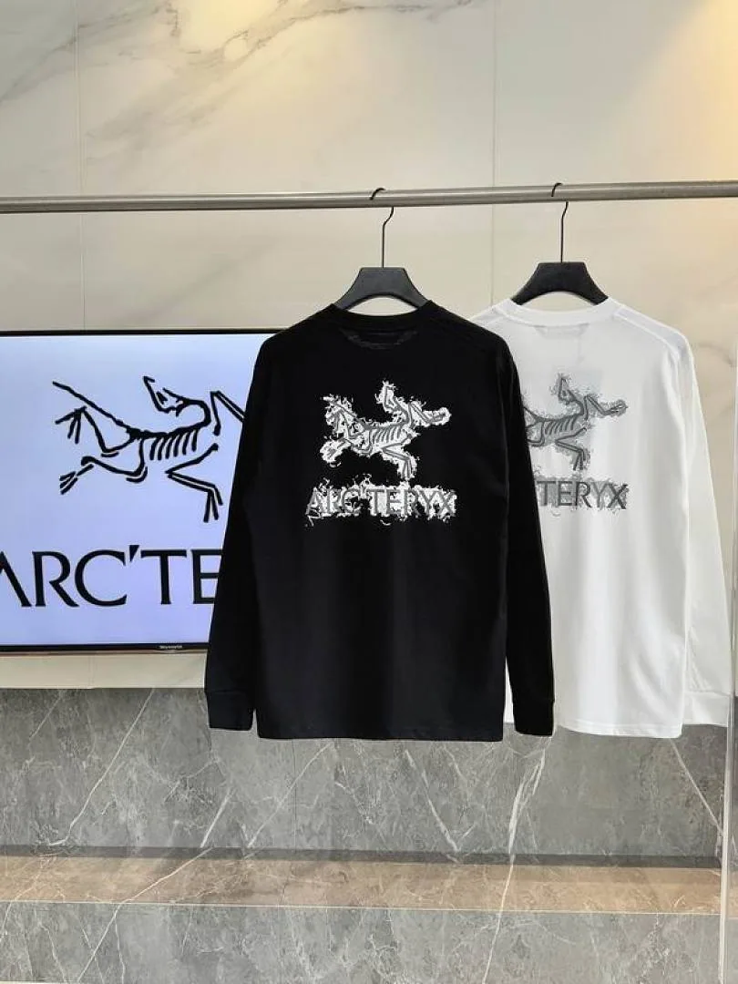Black and white Arcteryx tops with larger back graphics hgntx26045