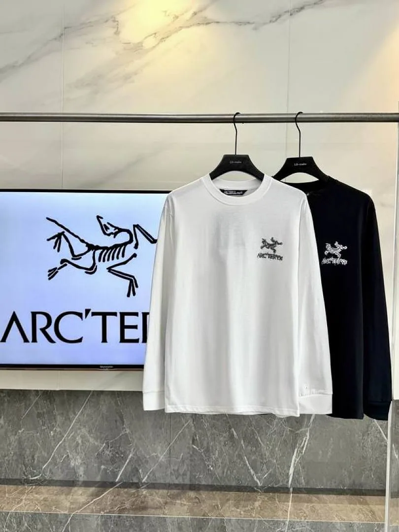 White and black Arcteryx cross-graphic tops color comparison hgntx26045