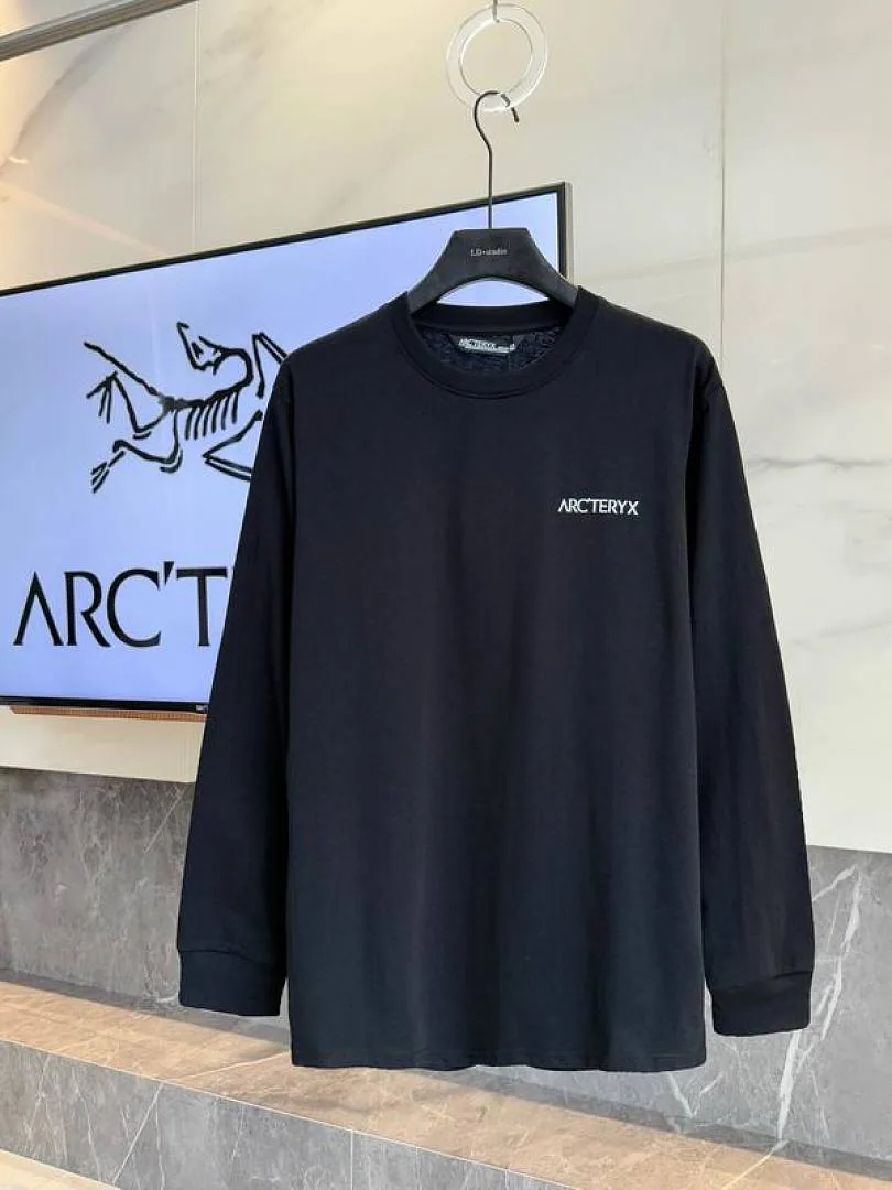 Black Arcteryx red-line graphic long-sleeve top front view hgntx26047