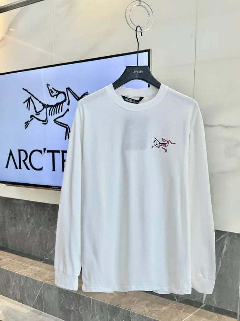 White Arcteryx three-color bird graphic long-sleeve top front view hgntx26048