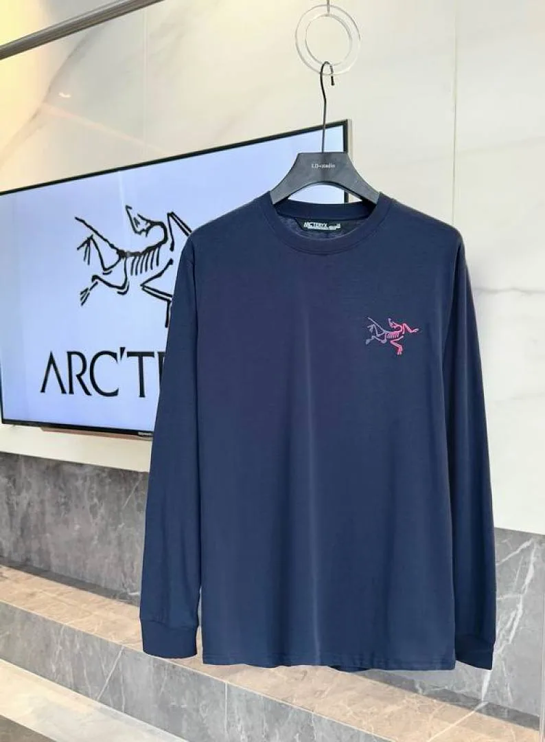 Navy Arcteryx bird graphic long-sleeve top front view hgntx26048