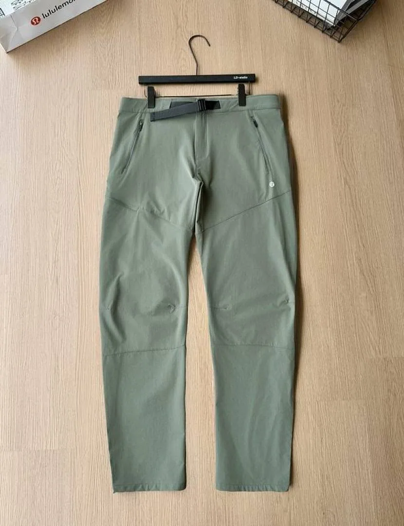 Lululemon sage green tapered pants front product view hgntx41