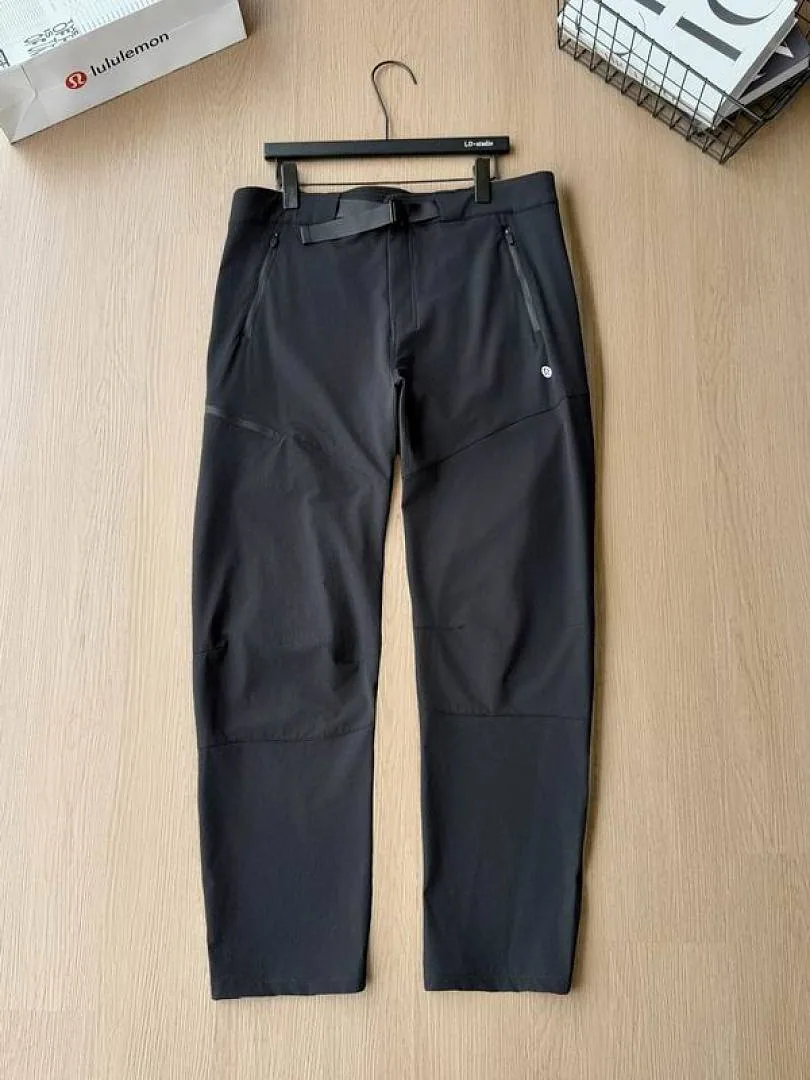 Lululemon black tapered pants front product view hgntx41