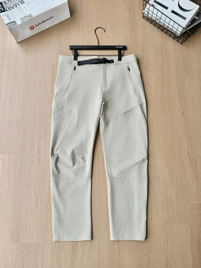Lululemon cream tapered pants front product view hgntx41