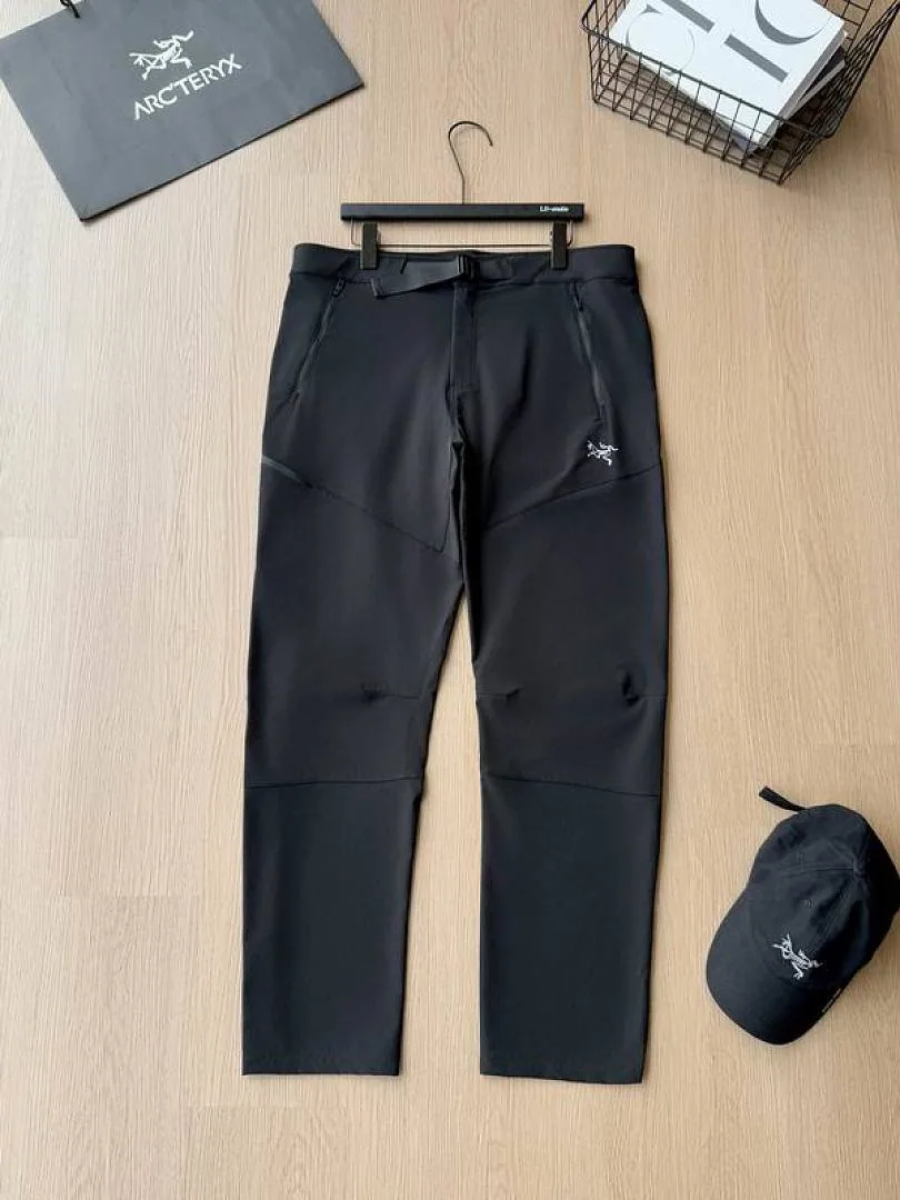Black Arcteryx tapered pants flat product view hgntx71