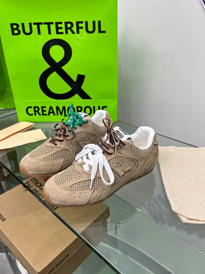 Miu Miu 07 Beige Low-Top Sneakers beige low-top sneakers with green and brown lace accents view 2