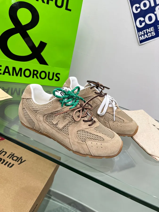 Miu Miu 07 Beige Low-Top Sneakers beige low-top sneakers with green and brown lace accents view 3