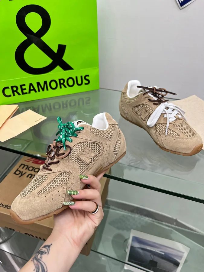 Miu Miu 07 Beige Low-Top Sneakers beige low-top sneakers with green and brown lace accents view 5