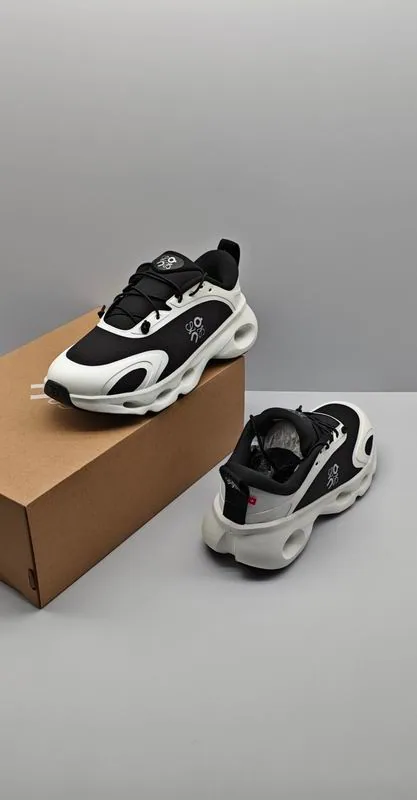 Loewe HNX0501 Black White Runner Sneakers black and white runner sneakers with sculpted sole and lace-up closure view 3