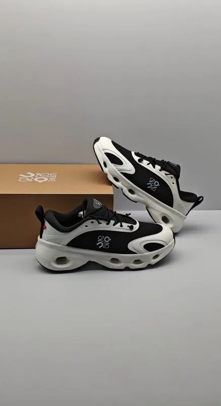 Loewe HNX0501 Black White Runner Sneakers black and white runner sneakers with sculpted sole and lace-up closure view 4