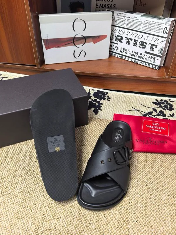 Valentino MNS0601 Black Slide Sandals black open-toe slide sandals with wide upper band and flat sandal stance view 3