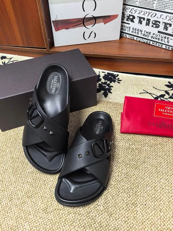 Valentino MNS0601 Black Slide Sandals black open-toe slide sandals with wide upper band and flat sandal stance view 4