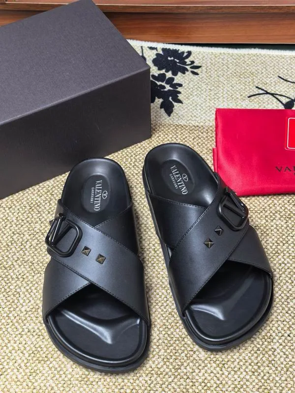 Valentino MNS0601 Black Slide Sandals black open-toe slide sandals with wide upper band and flat sandal stance view 5