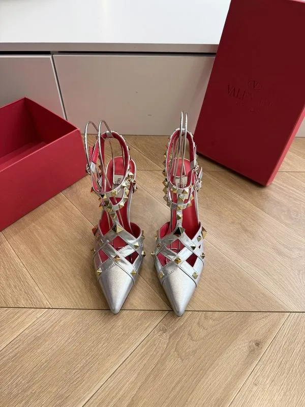 Valentino MNS0708 Silver Pointed Slingback Heels metallic silver pointed heels with slingback-style straps and red accent details view 1