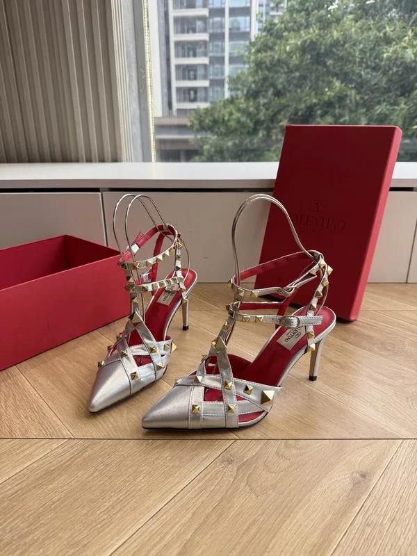 Valentino MNS0708 Silver Pointed Slingback Heels metallic silver pointed heels with slingback-style straps and red accent details view 2