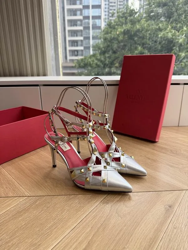 Valentino MNS0708 Silver Pointed Slingback Heels metallic silver pointed heels with slingback-style straps and red accent details view 3