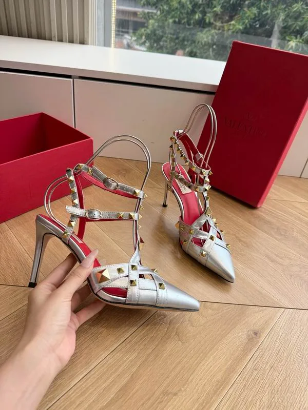 Valentino MNS0708 Silver Pointed Slingback Heels metallic silver pointed heels with slingback-style straps and red accent details view 4