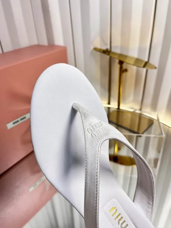 Miu Miu MNS0701 White 5cm Slide Sandals white 5 cm heeled slide sandals with dark sole edge view 4